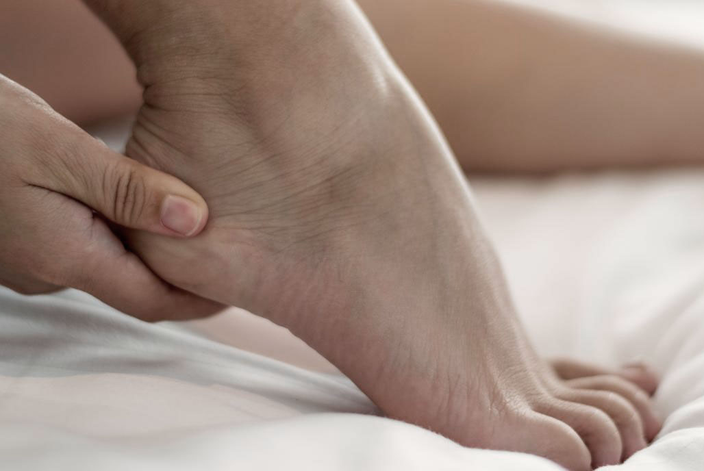 Pain on top of foot near ankle when walking